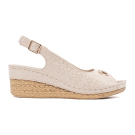 Goodin Beige wedge sandals with a buckle