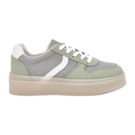 Low women's sneakers on the green platform Low women's sneakers on the green platform