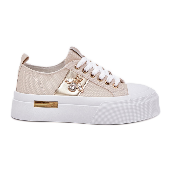 Women's sneakers on the platform with decorative detail beige
