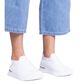 White slip-on sports sneakers