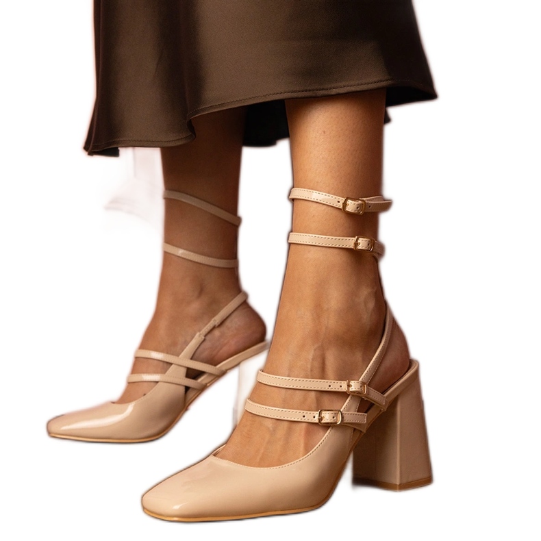 Beige lacquered pumps with a high heel Beige lacquered pumps with a high heel