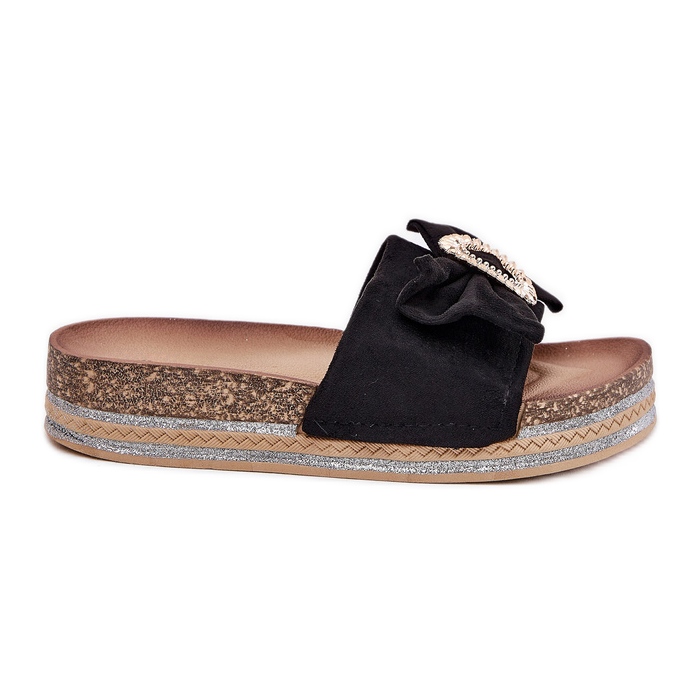 Women's flip flops on the platform with a bow and a decorative brooch black