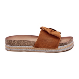 Women's flip flops on the platform with a bow and a decorative Camel brooch brown