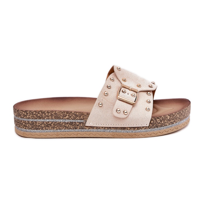 Women's flip flops on the platform with a buckle and studs beige