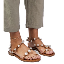 Brown women's sandals decorated with pearls