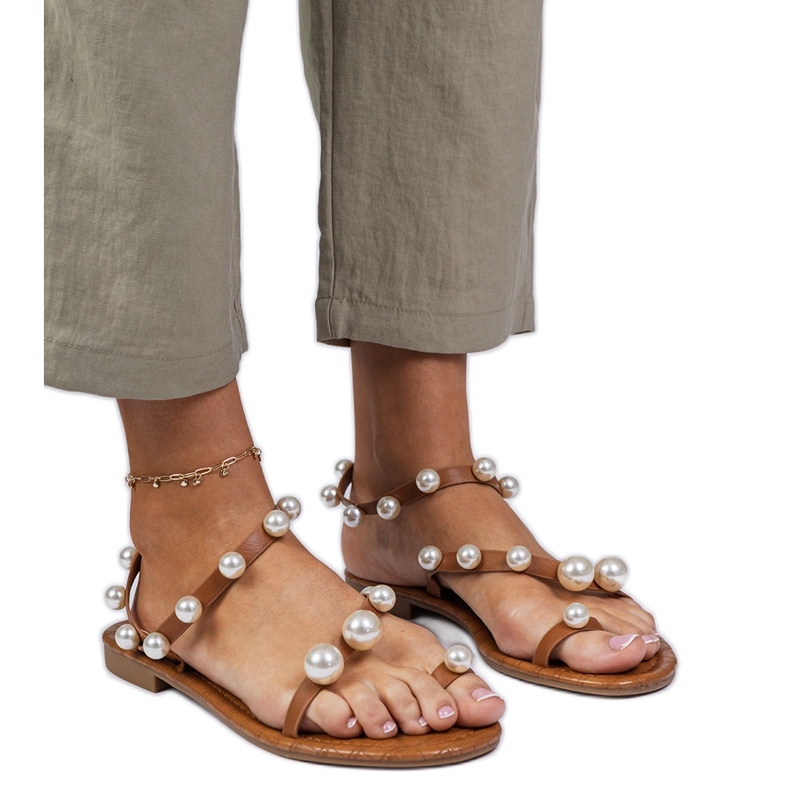 Brown women's sandals decorated with pearls