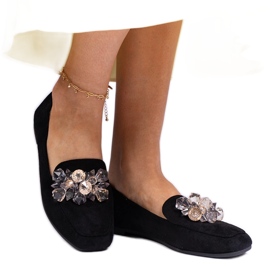 Black loafers decorated with crystals