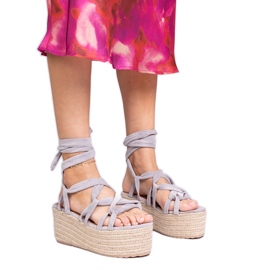 Gray espadrilles sandals on a high platform grey