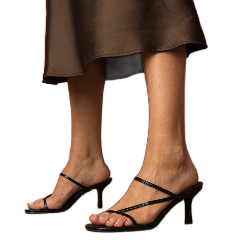 Black elegant flip flops on a high heel