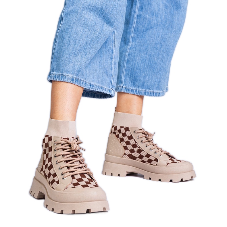 Brown boots sneakers on the platform Brown boots sneakers on the platform