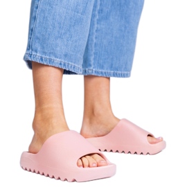 Pink women's rubber flip flops