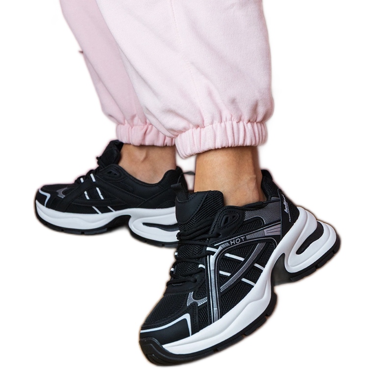 Black sports sneakers on a massive sole
