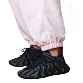 Black sports sneakers on a massive sole