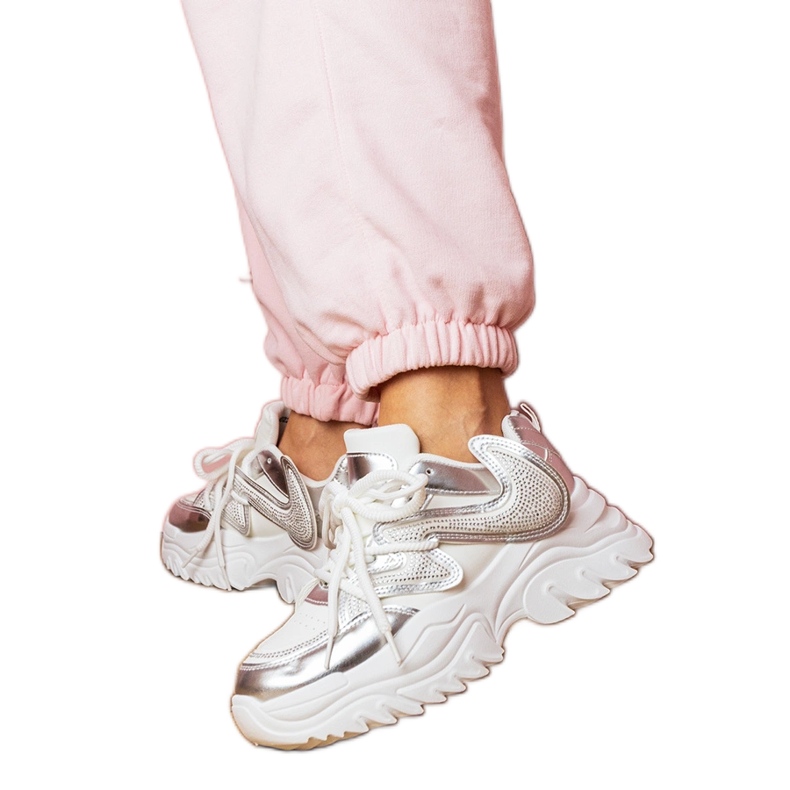 White sneakers on a massive sole with zircons White sneakers on a massive sole with zircons