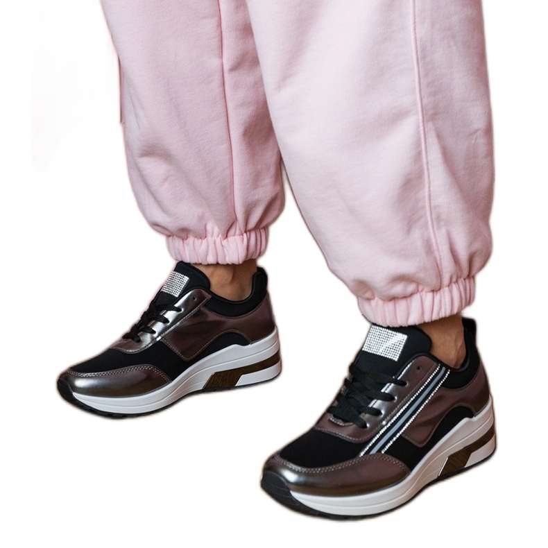 Black sneakers with zircons and a metallic insertion