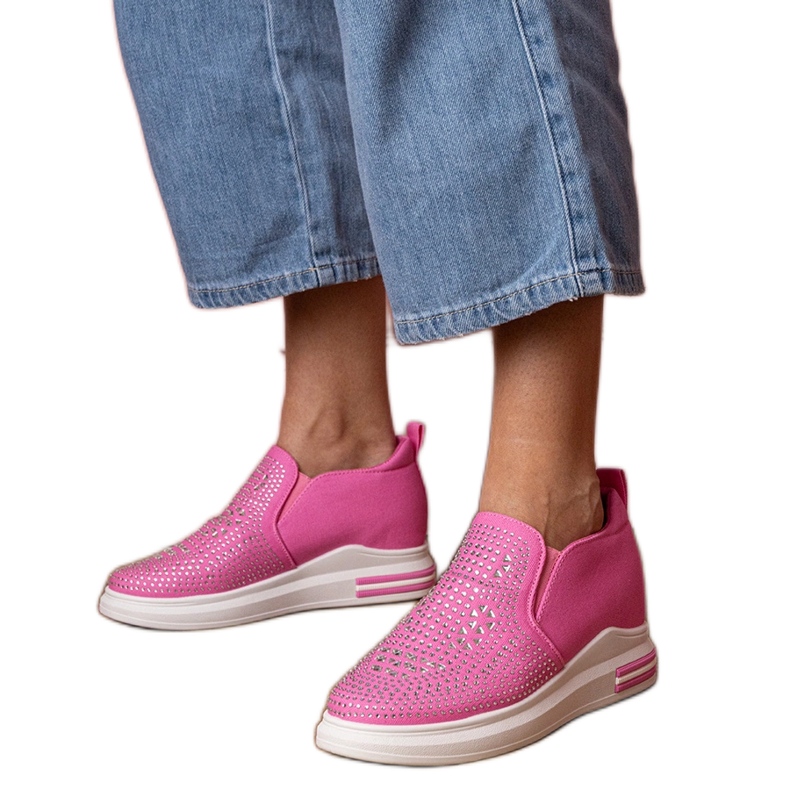Pink women's sneakers with zircons on a hidden wedge