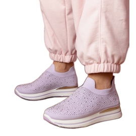 Purple women's sneakers on the platform with zircons