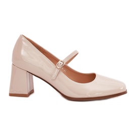 Painted pumps on the post with a belt and buckle beige