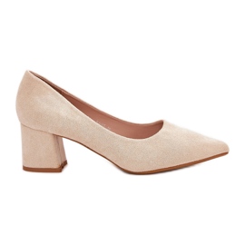 Women's pumps with pointed toes on the post beige