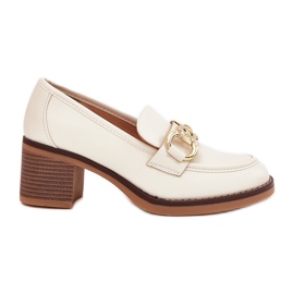 Women's shoes with a golden detail with beige heels