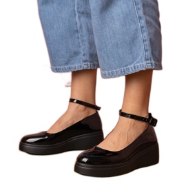 Black shoes varnished on the platform Black shoes varnished on the platform