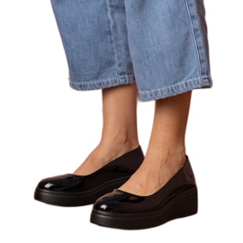 Black shoes varnished on the platform Black shoes varnished on the platform