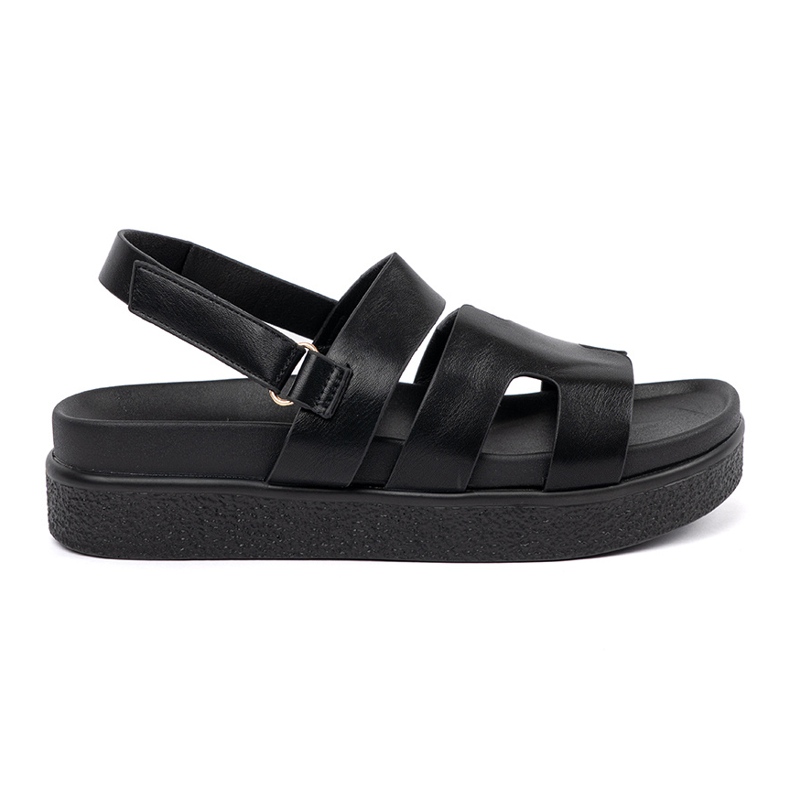 Goodin Classic sandals on the black platform