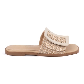 Goodin Tedeed flaps on a flat beige sole