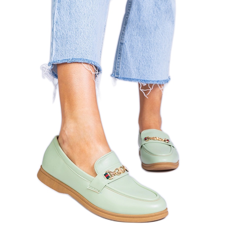 Green moccasins with gold decoration
