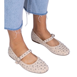 Beige ballerinas with studs and buckles