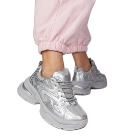 Silver sports sneakers on a thick sole Silver sports sneakers on a thick sole