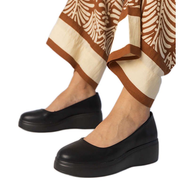 Black shoes on the eco -leather platform Black shoes on the eco -leather platform