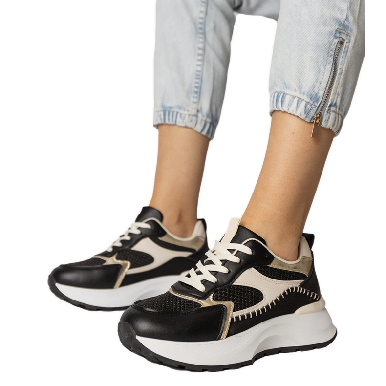 Black sports sneakers with a braided insert