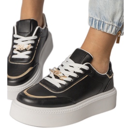 Black sneakers decorated with glitter and zircons Black sneakers decorated with glitter and zircons