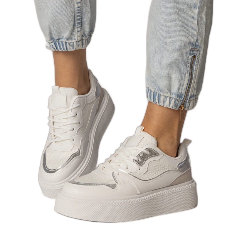 White sneakers with a material insert