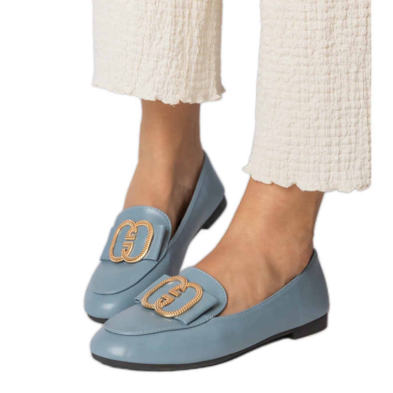 Blue women's loafers with a golden decoration