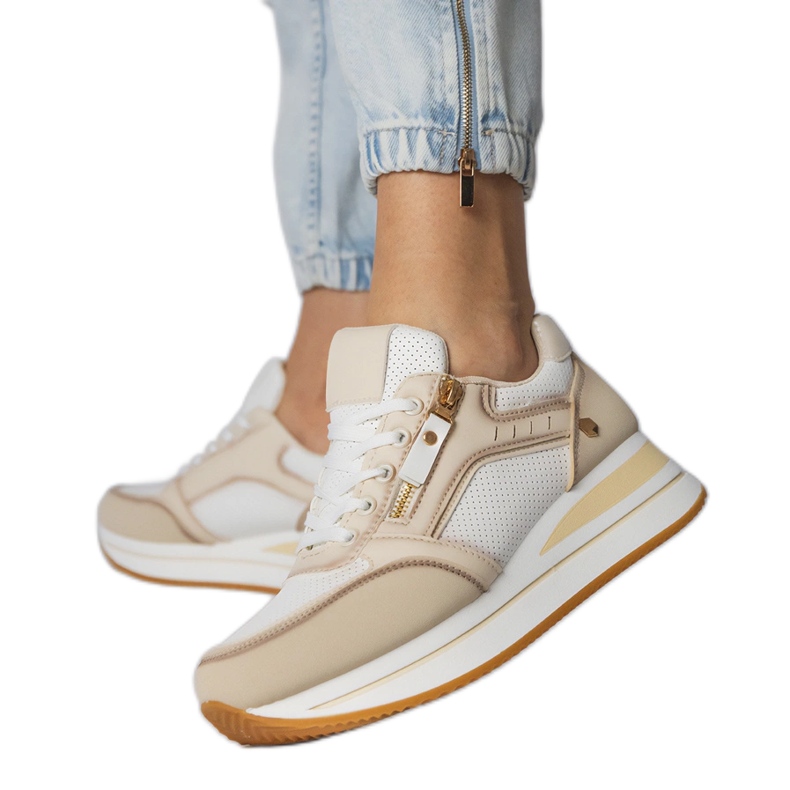 Beige sports sneakers decorated with a slider Beige sports sneakers decorated with a slider