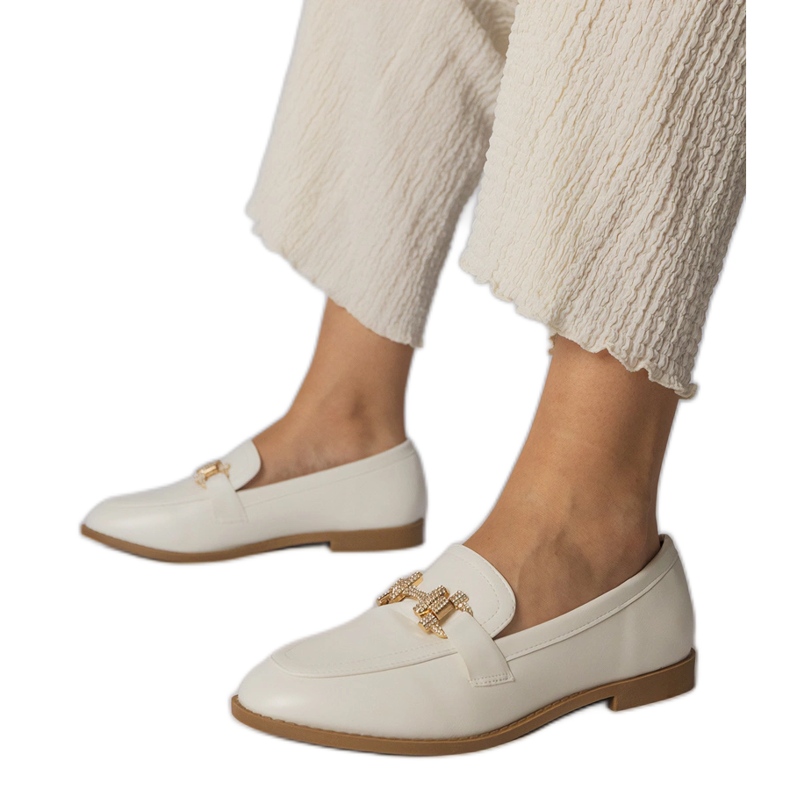White loafers decorated with zircons White loafers decorated with zircons
