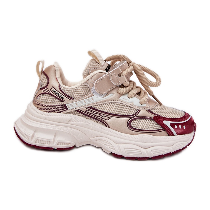 Children's sneakers on a thick gold sole golden Children's sneakers on a thick gold sole golden