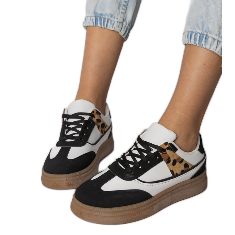 White and white sneakers with a leopard accessory