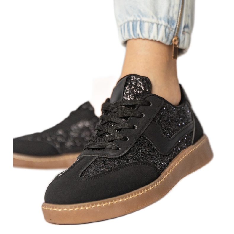 Black women's sneakers decorated with glitter