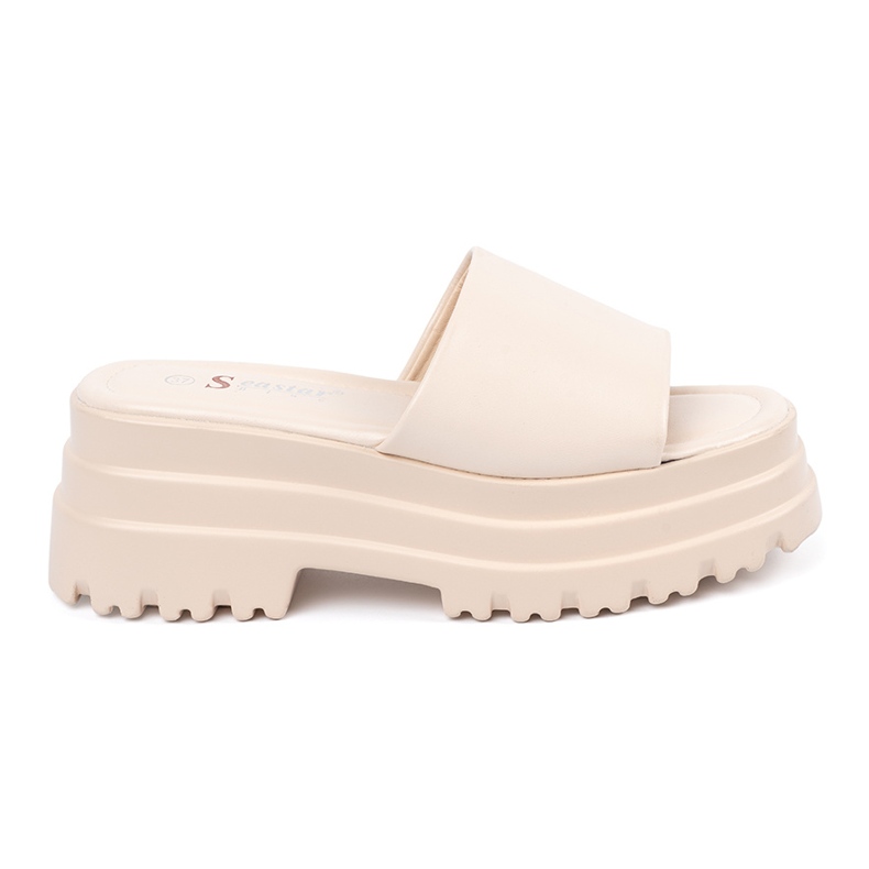 Seastar Slippers on the light beige platform