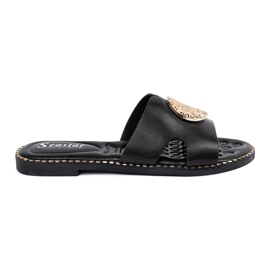 Seastar Black flip flops with a golden decoration