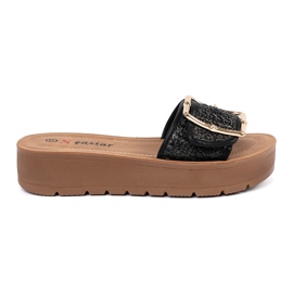 Seastar Black flip flops decorated with a golden clamp