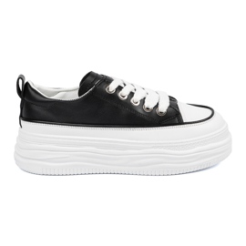Black and white sneakers on the platform Black and white sneakers on the platform