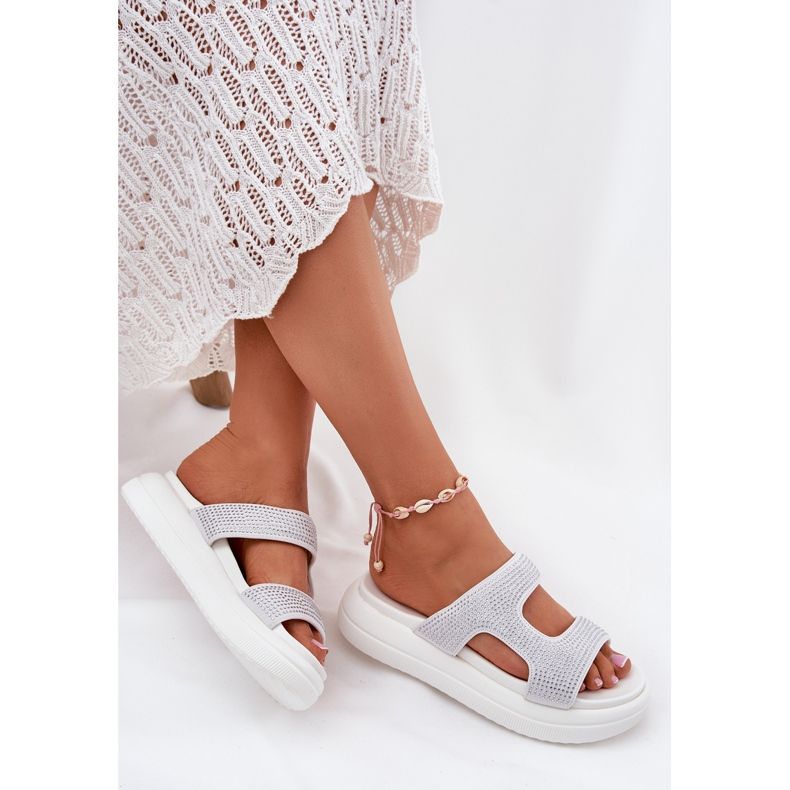 Inna Decorated women's flip flops on the white platform