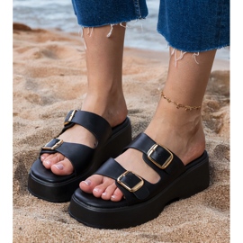 Black flip flops with clamps on stripes