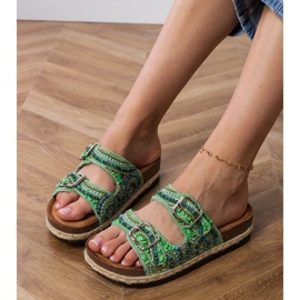 Green ethnic flip flops with clamps on stripes