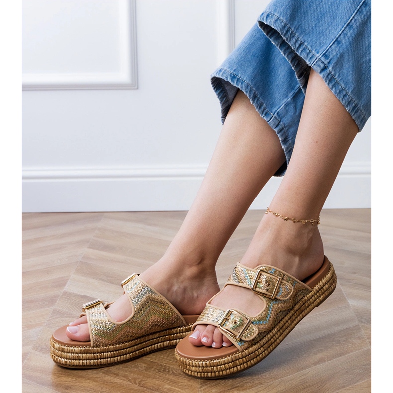 Golden flip flops with clamps on stripes