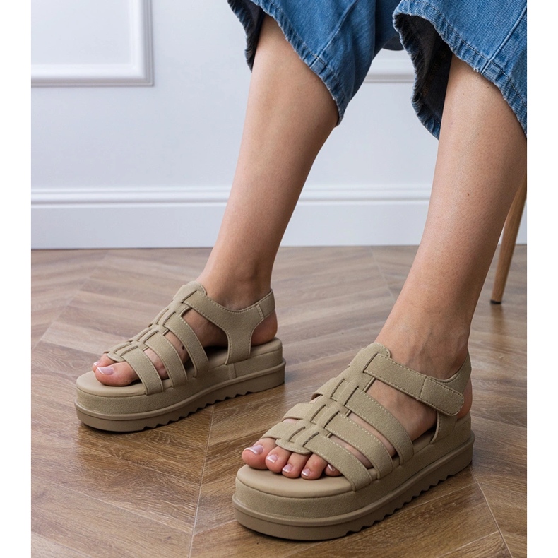 Dark beige gladiator sandals on the platform Dark beige gladiator sandals on the platform